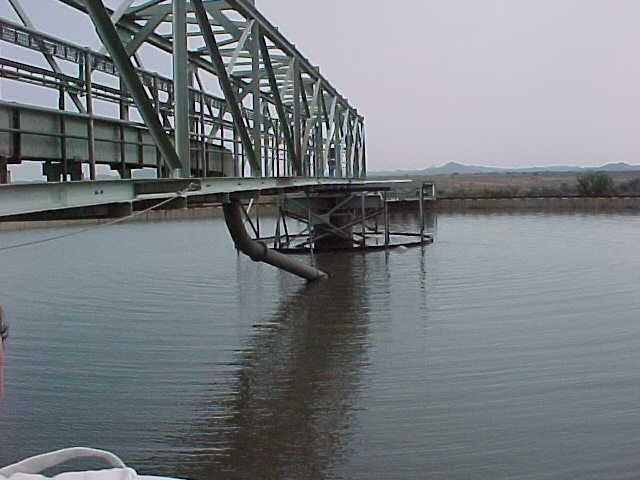 Mining process plant thickener bridge over water