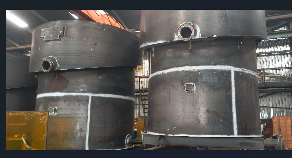 Large flotation cell tanks under fabrication in a workshop