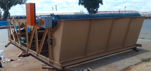 Skid-mounted linear screen assembly with drive motors in a fabrication yard